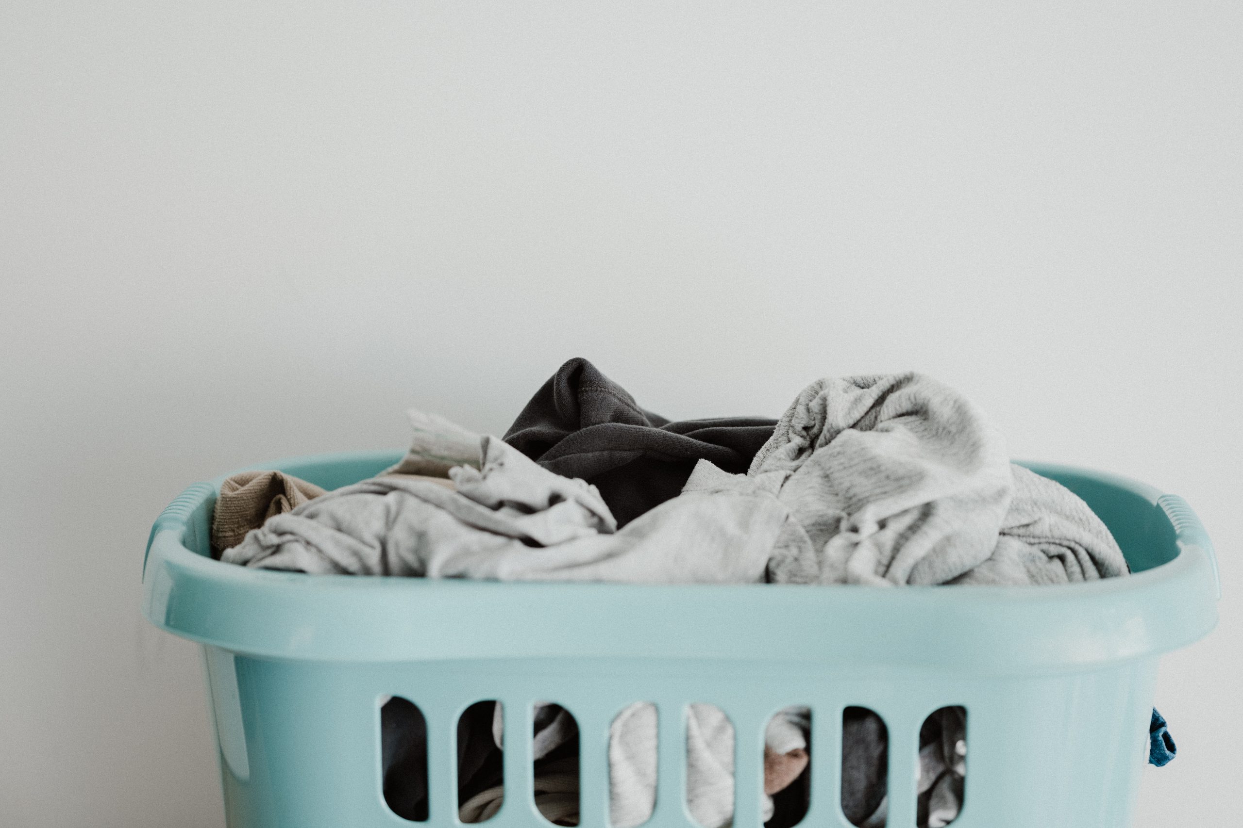 Laundry in light blue basket